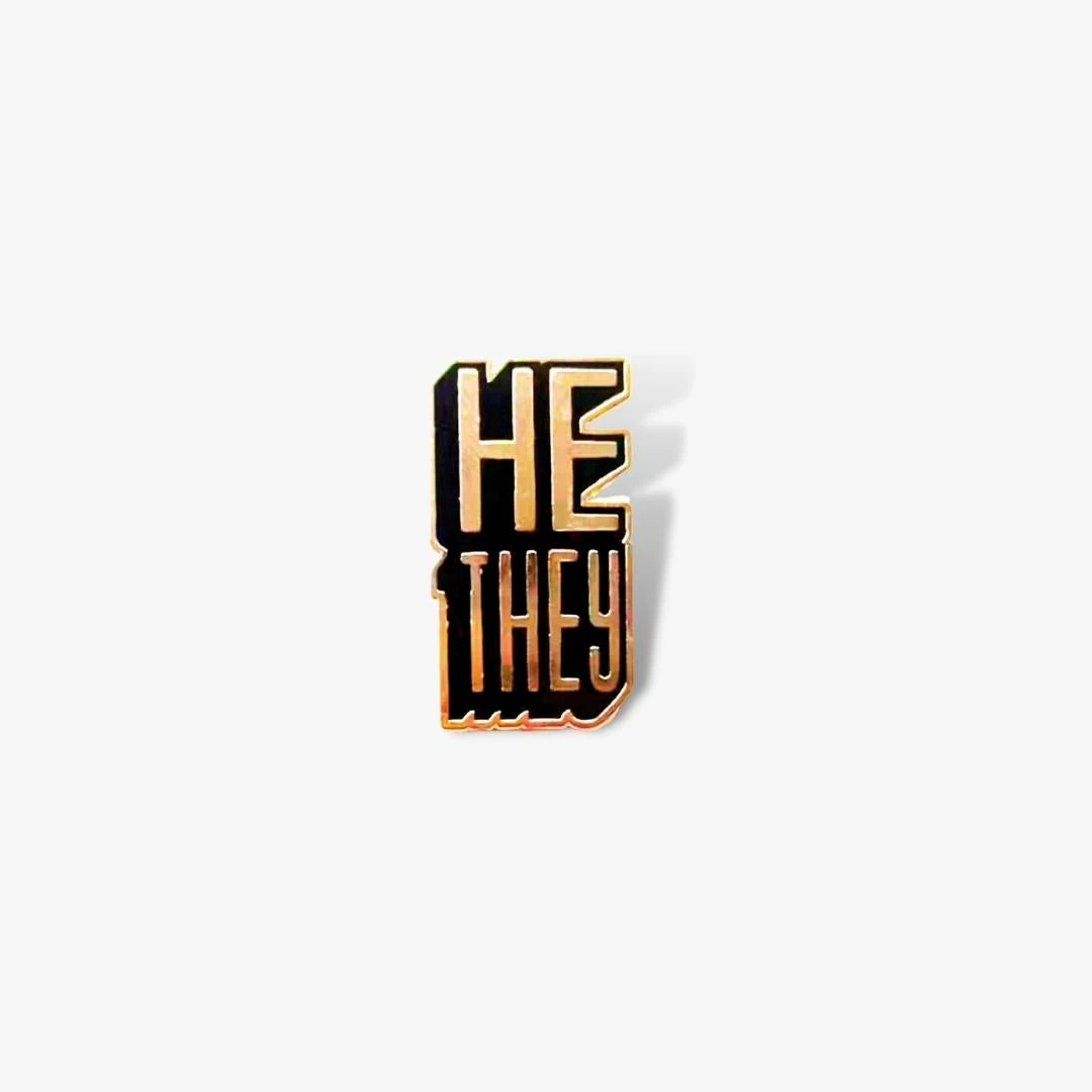 Autostraddle He/They Pronoun Pin 1 Autostraddle He/They Pronoun Pin